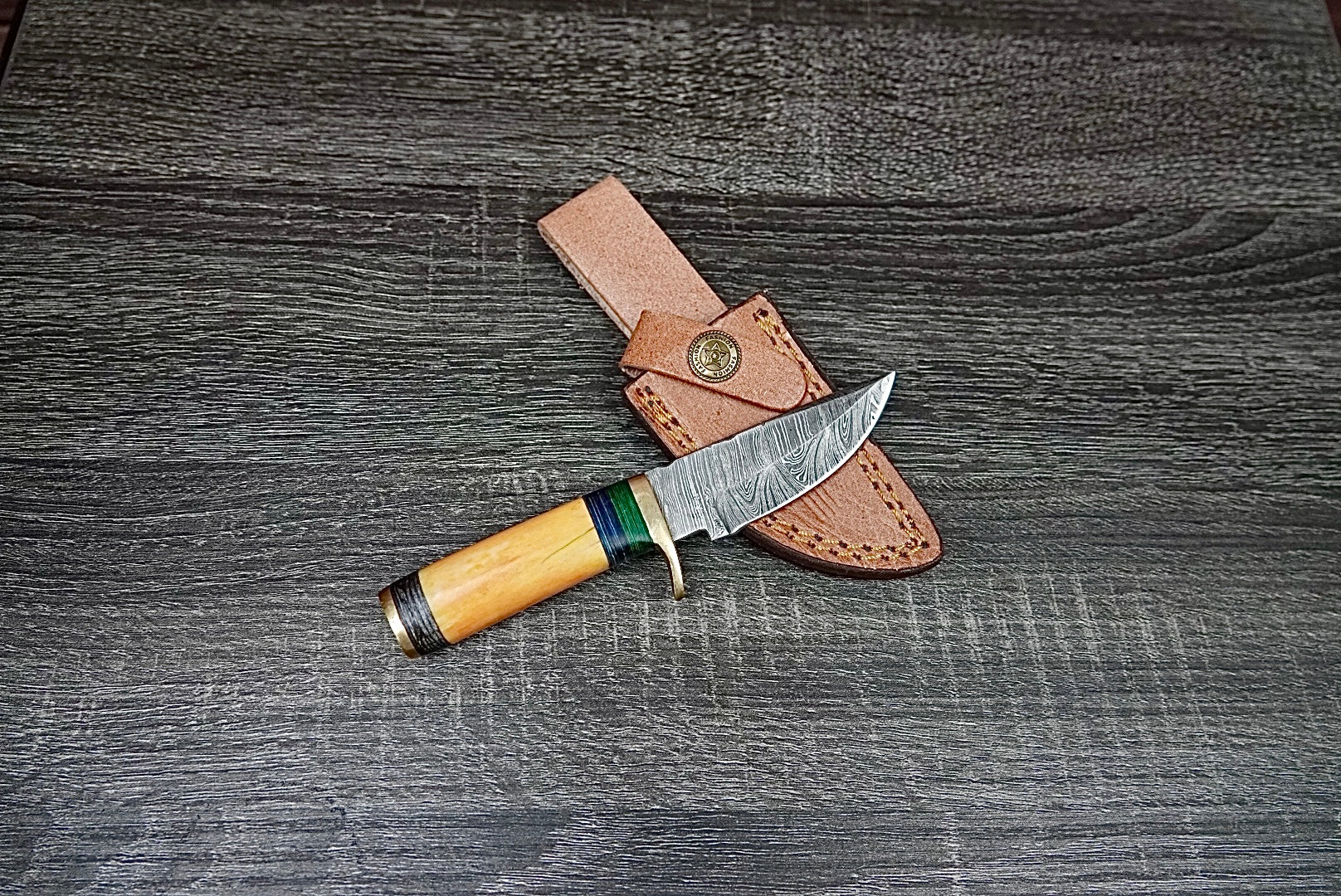 6” custom handmade Damascus steel with finger guard