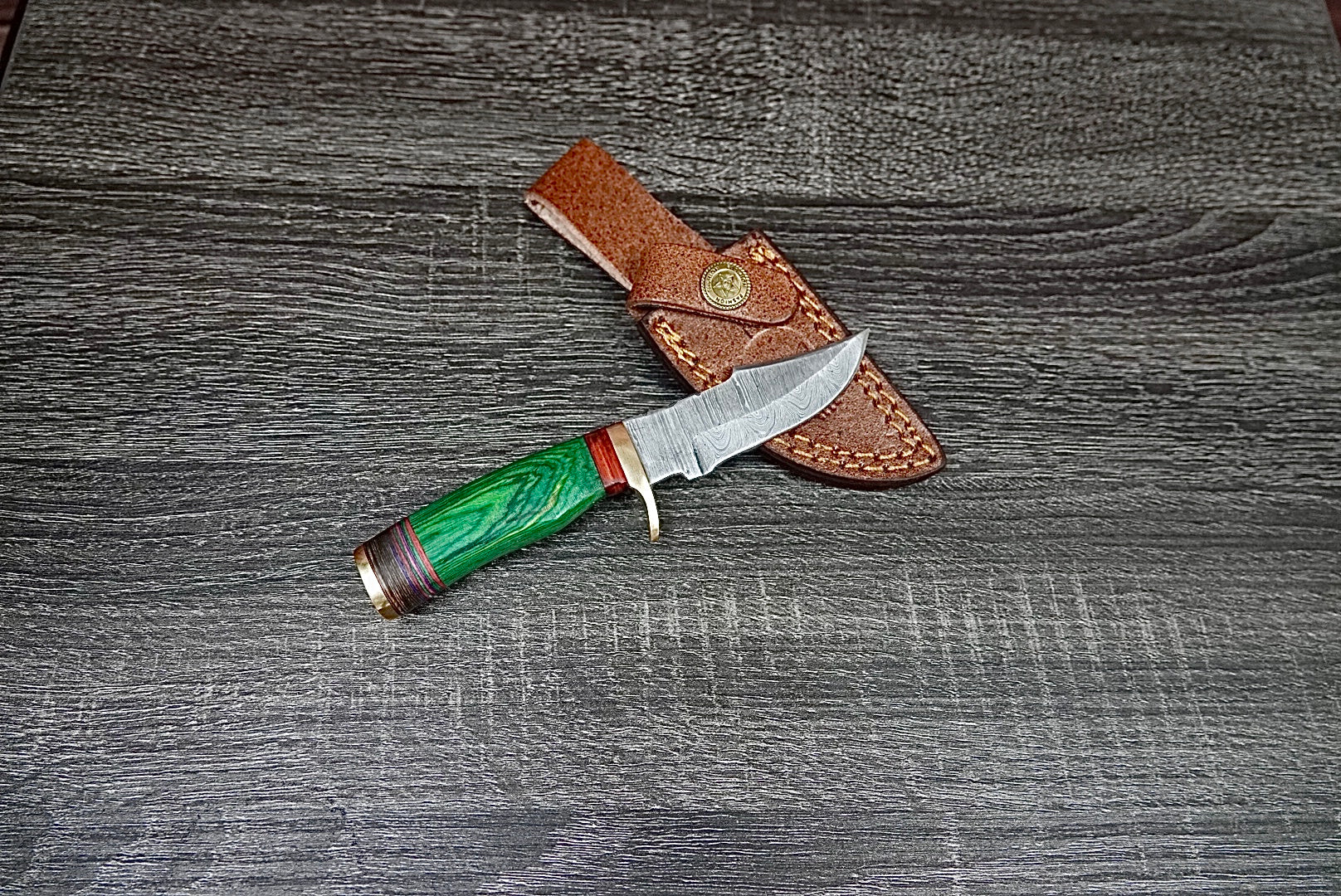 6” custom handmade Damascus steel with finger guard