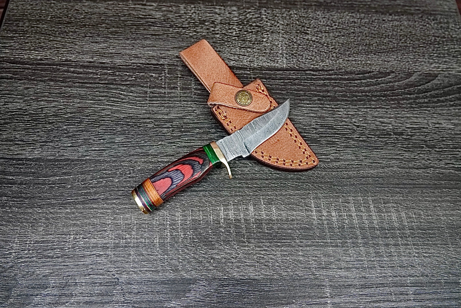 6” custom handmade Damascus steel with finger guard