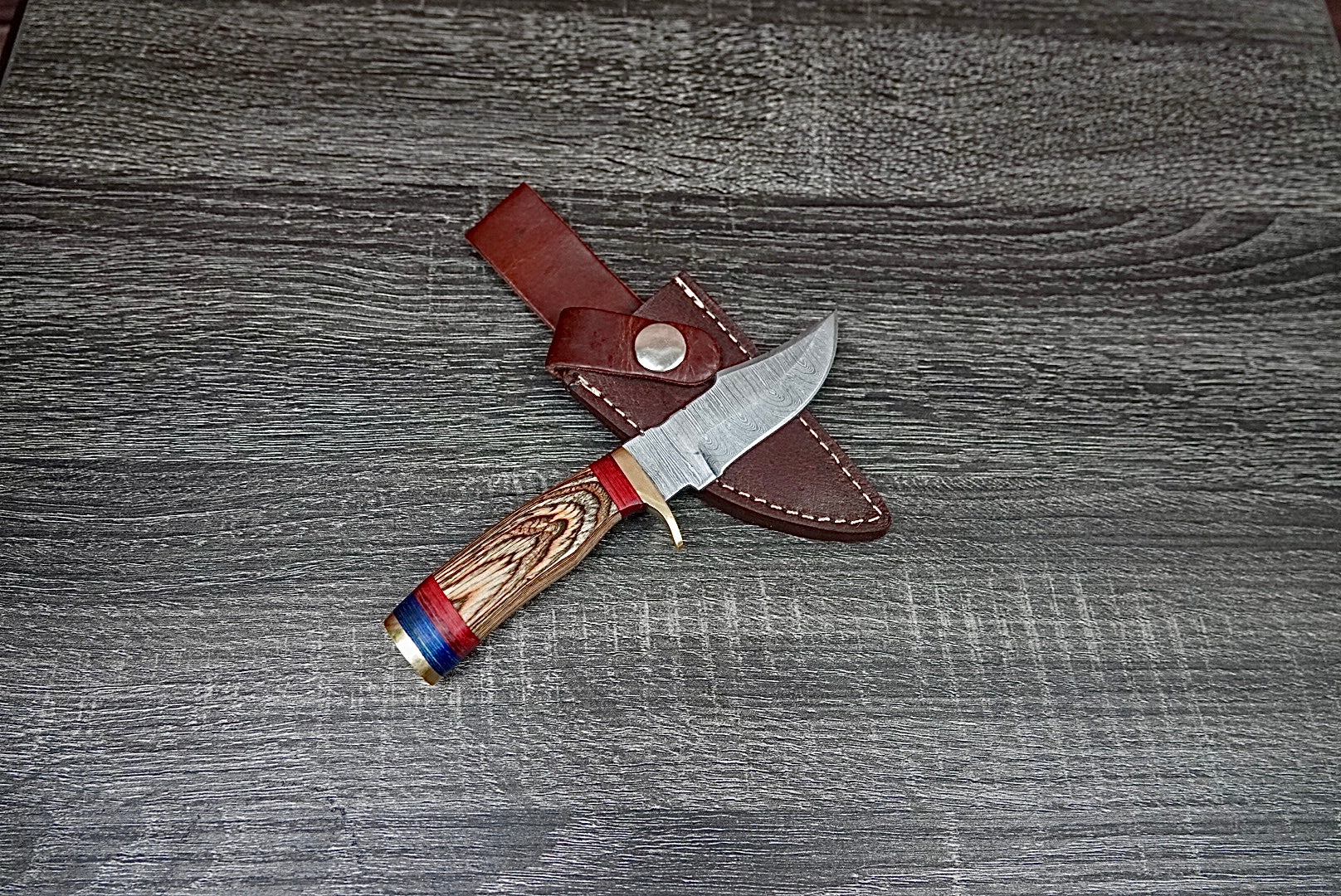 6” custom handmade Damascus steel with finger guard