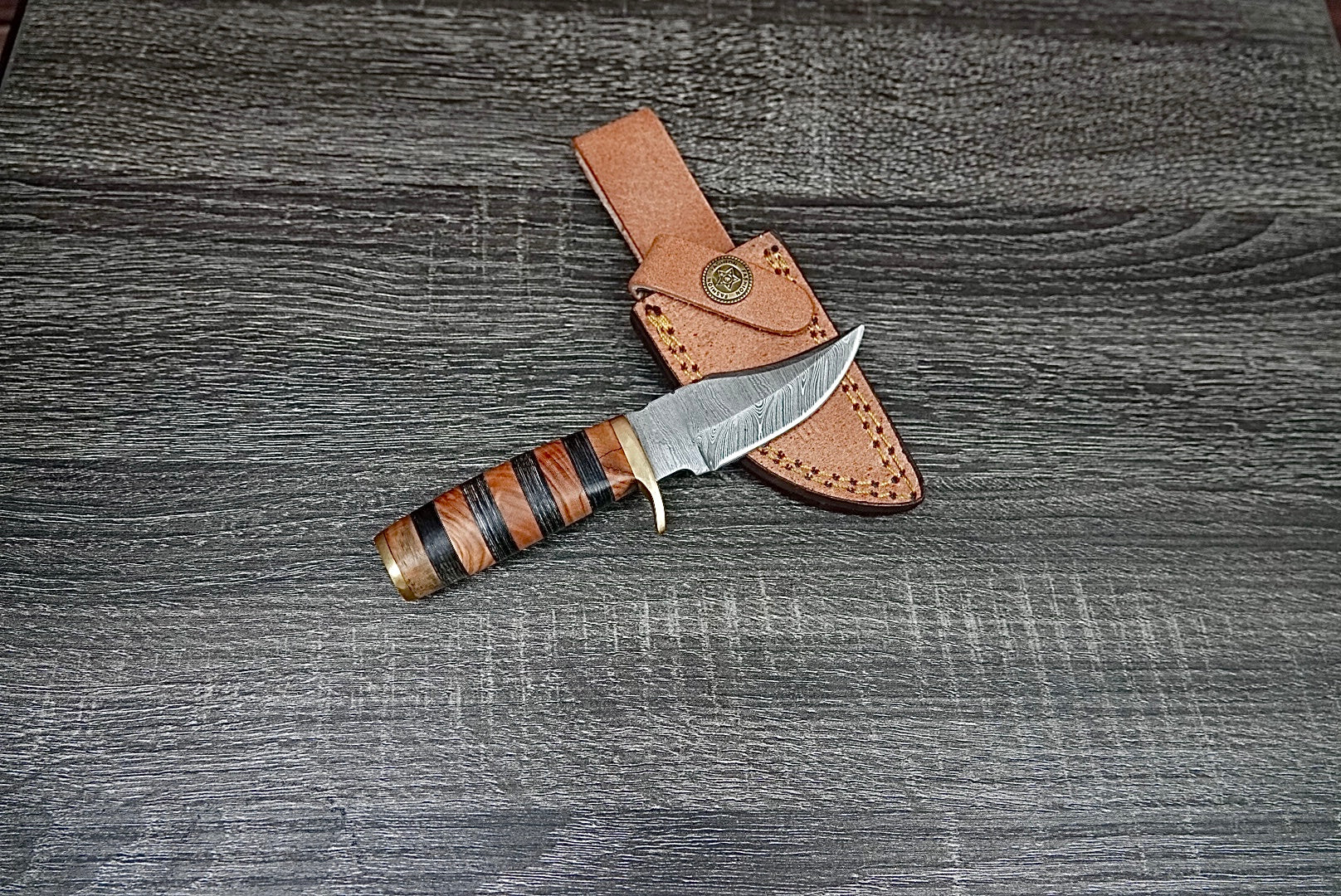 6” custom handmade Damascus steel with finger guard